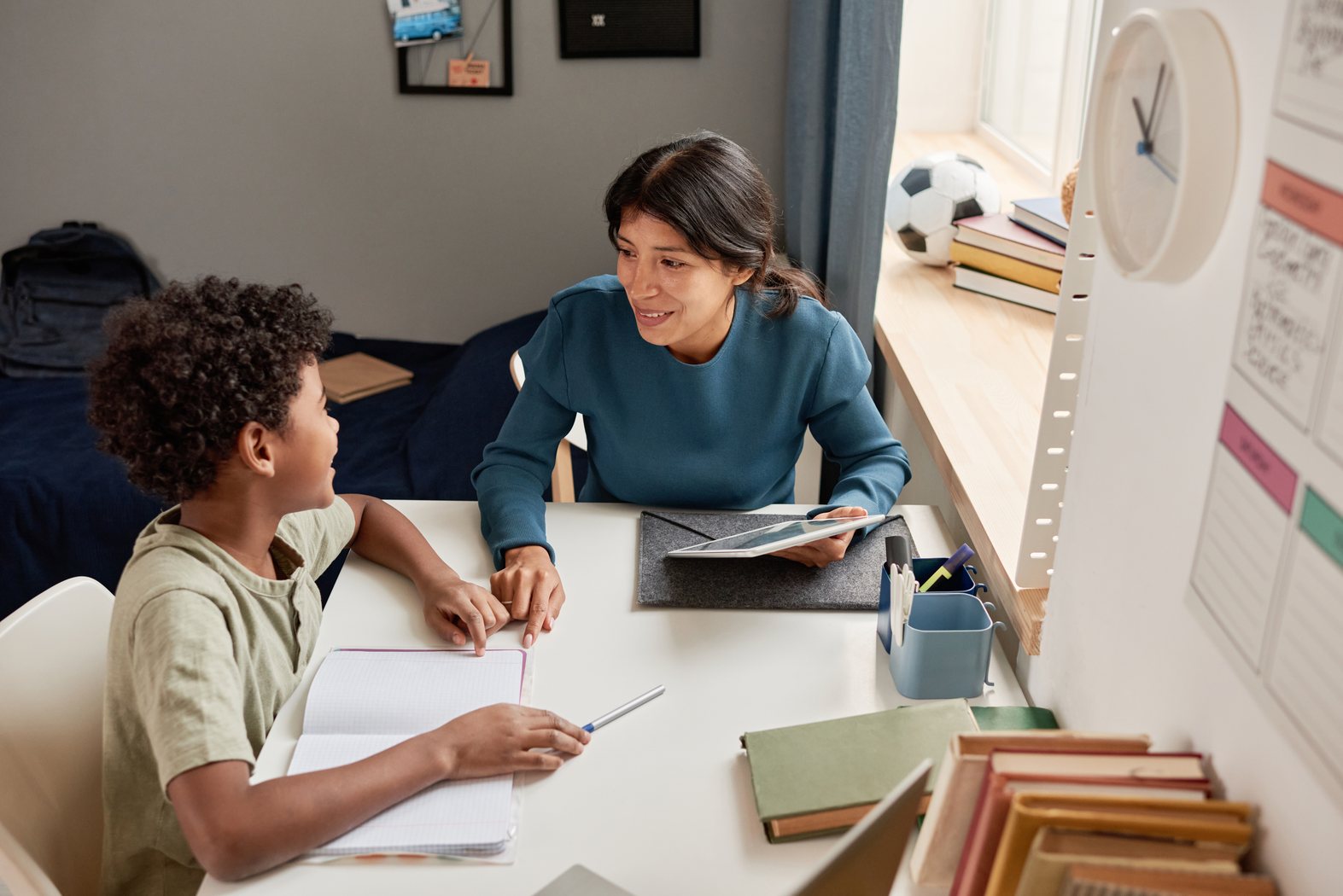 Student and tutor reviewing school plans together