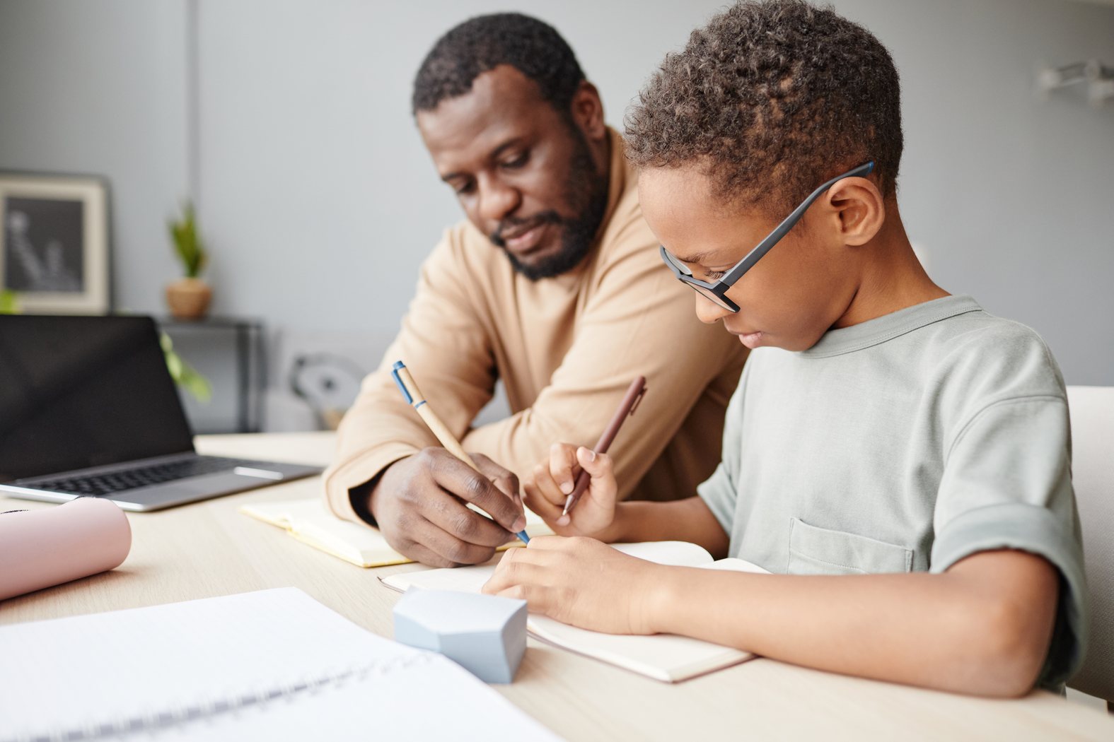 Parent helping a child with homework